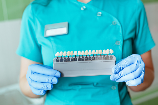Dental Veneers: Is It Time To Repair Or Replace Them?